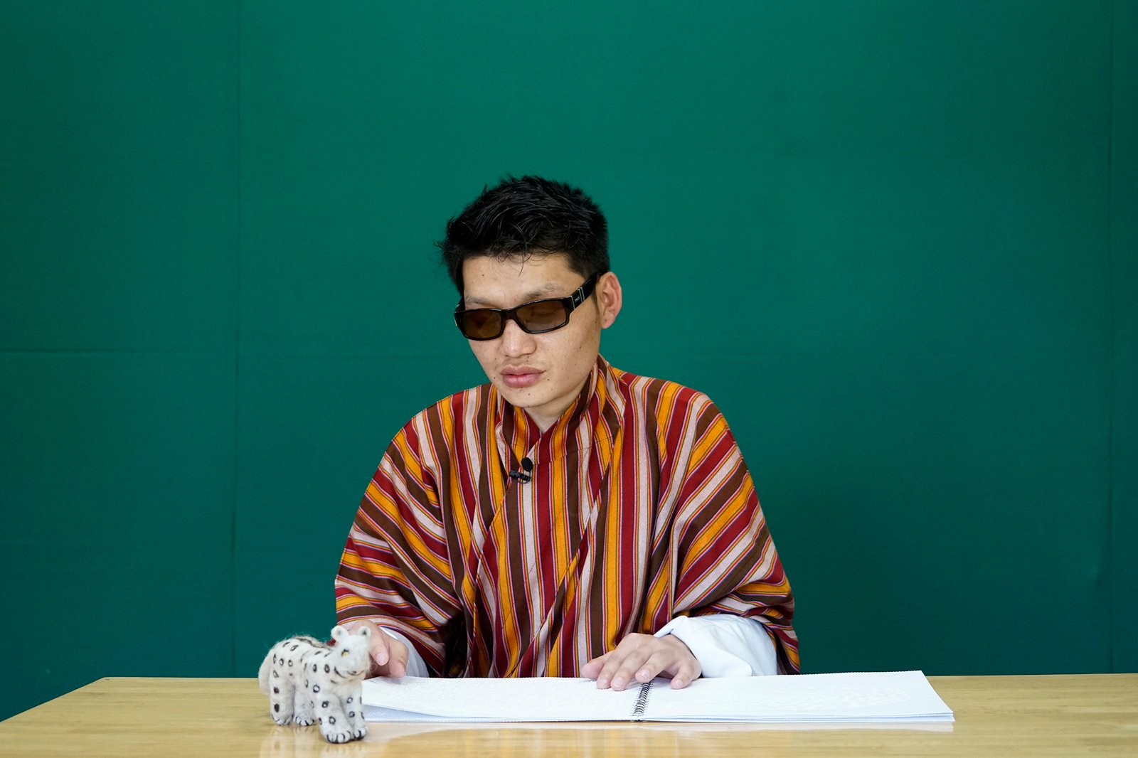 Watch “Snow Leopard and Norbu the Cat” Read in Braille and Bhutan Sign Language